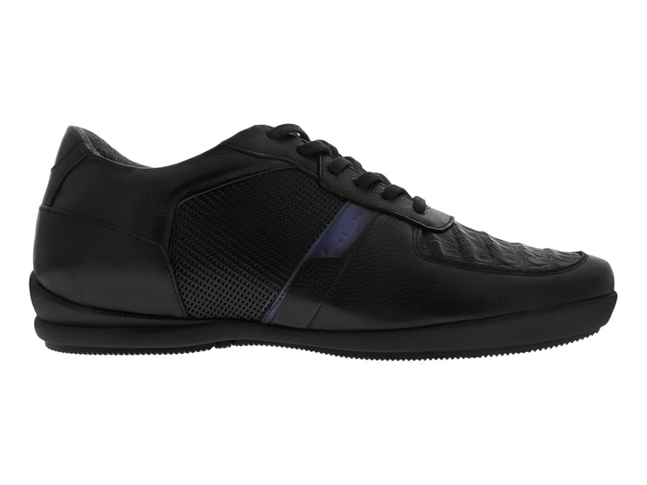 Zapato casual negro de la marca Cuadra con detalles en piel de caimán y tejido lateral.