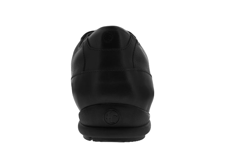 Zapato casual negro de la marca Cuadra con detalles en piel de caimán y tejido lateral.