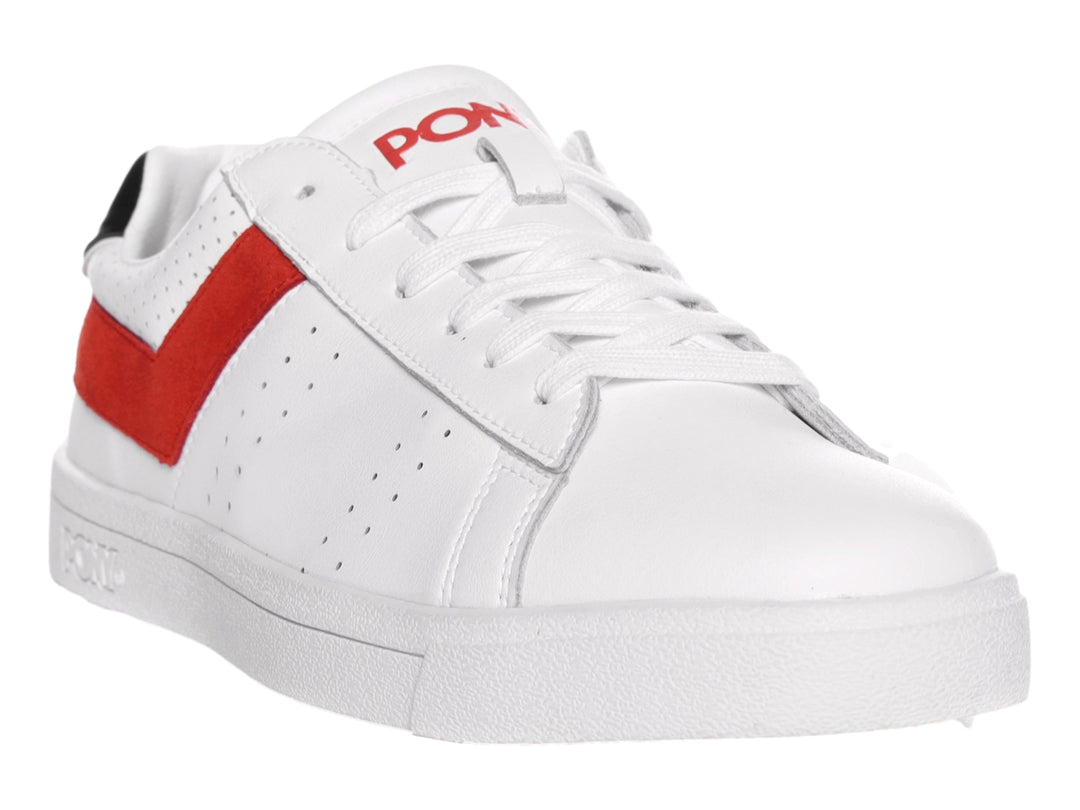 Tenis PONY blancos con una franja roja lateral y detalle negro en el talón.