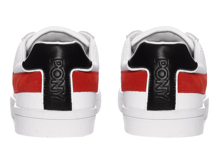 Tenis PONY blancos con una franja roja lateral y detalle negro en el talón.