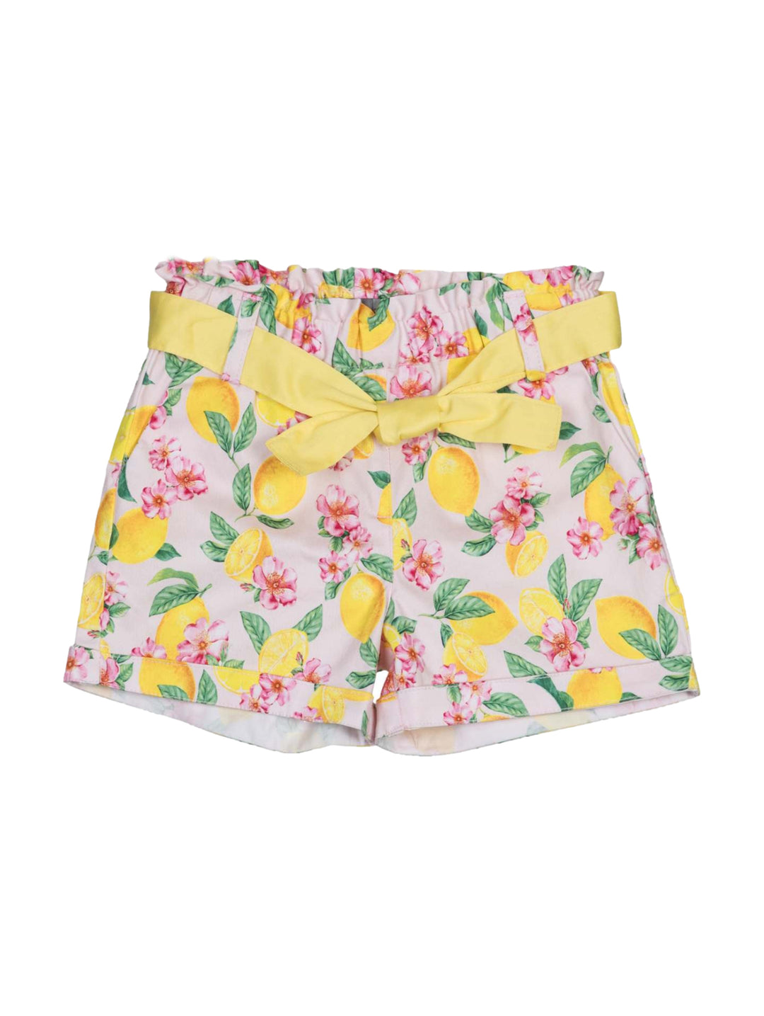 Short rosa para niña con estampado de limones y flores y un moño amarillo en la cintura.