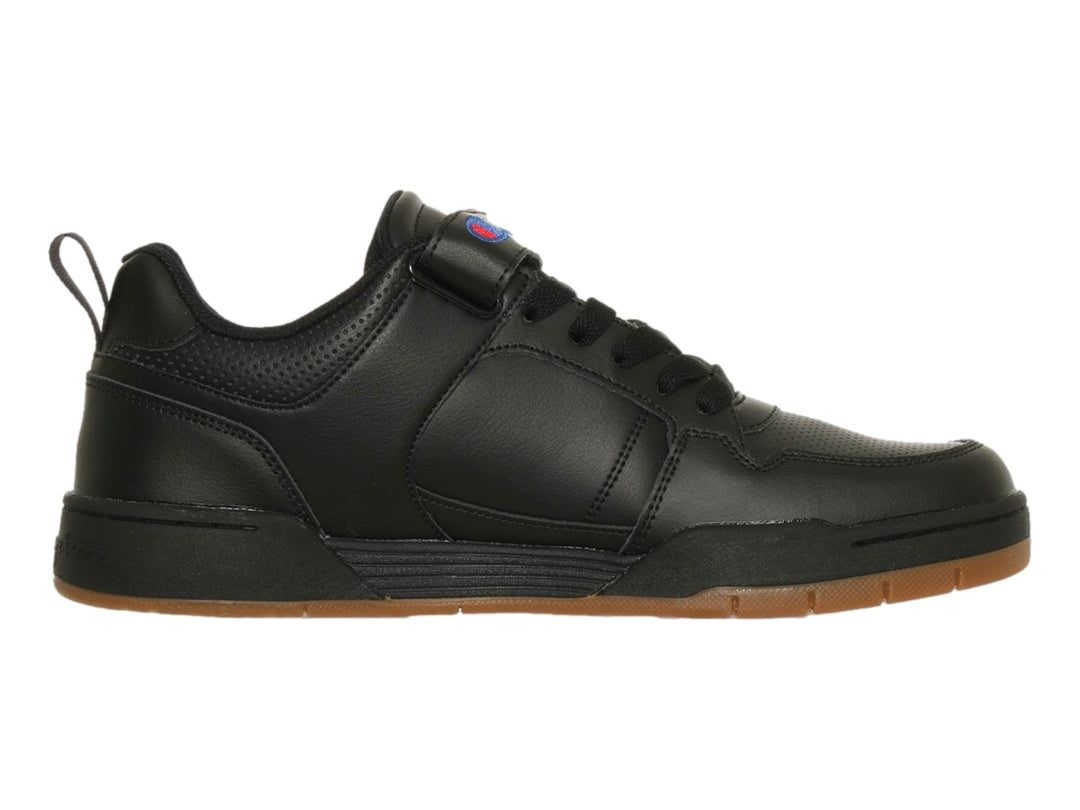 Tenis deportivos Champion Arena Power Lo color negro con suela color caramelo.
