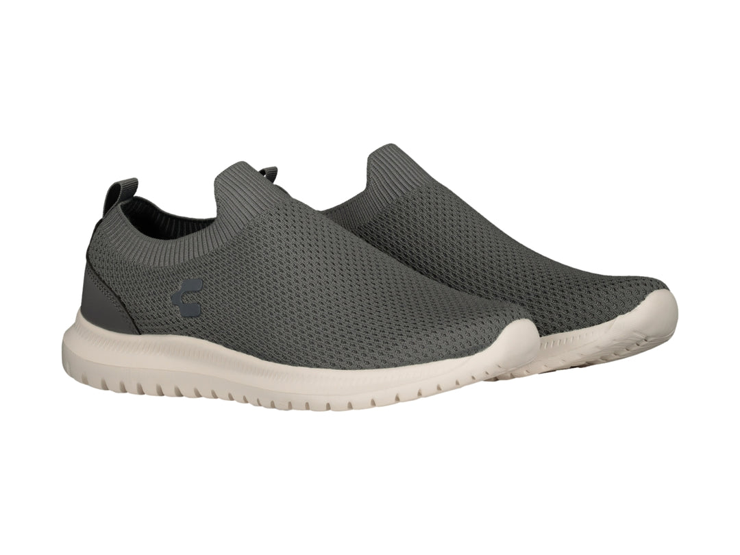 Tenis Charly color gris con suela blanca, diseño slip-on sin agujetas.