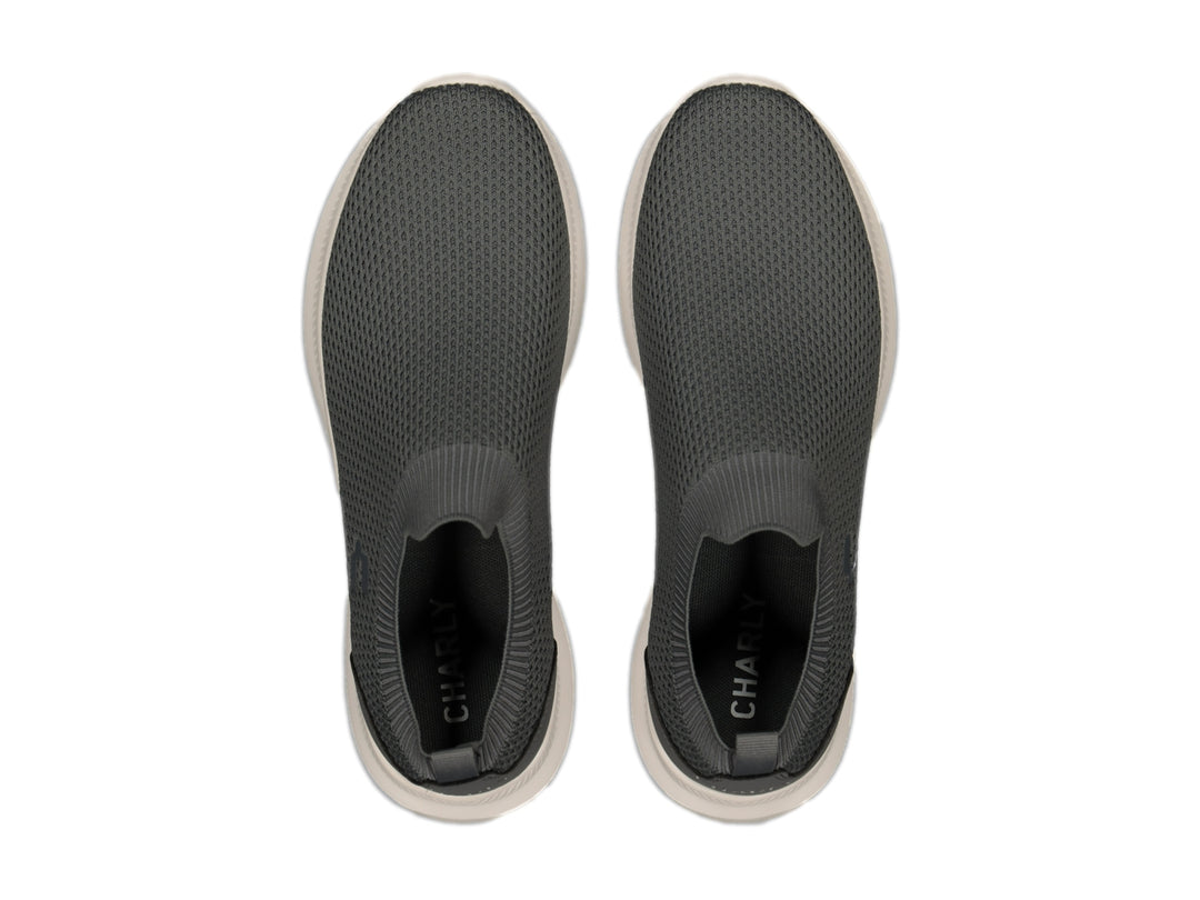 Tenis Charly color gris con suela blanca, diseño slip-on sin agujetas.