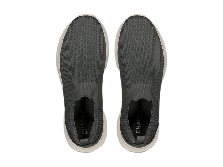 Tenis Charly color gris con suela blanca, diseño slip-on sin agujetas.