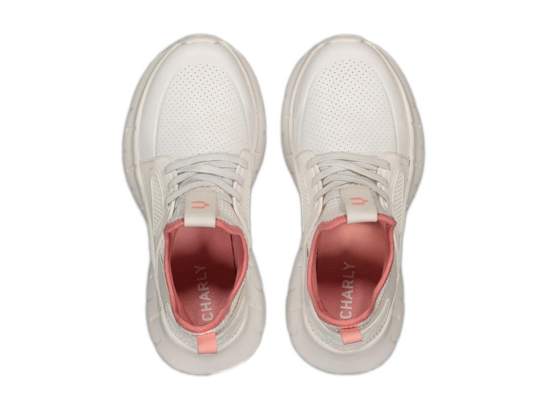 Tenis deportivos Charly color blanco con detalles en rosa en el cuello y lengüeta.