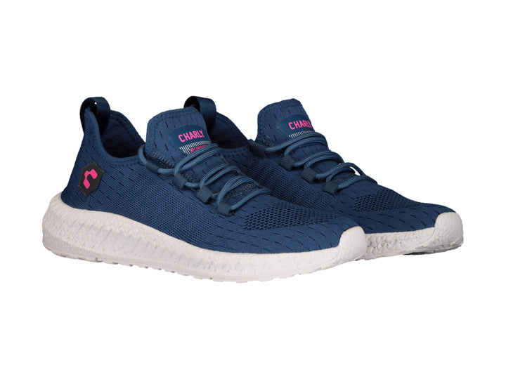 Tenis deportivos Charly en color azul con suela blanca y detalles en rosa.