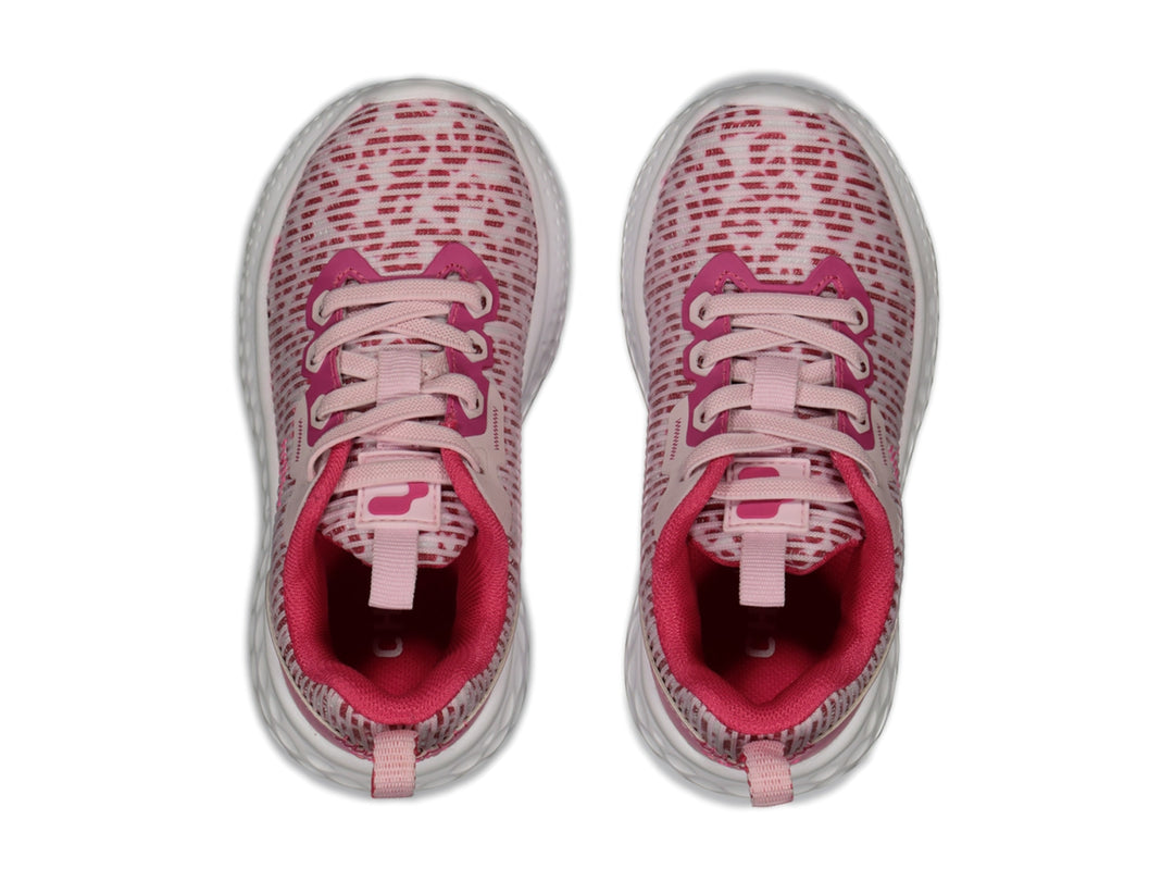 Tenis deportivos Charly color rosa y blanco con suela blanca texturizada.