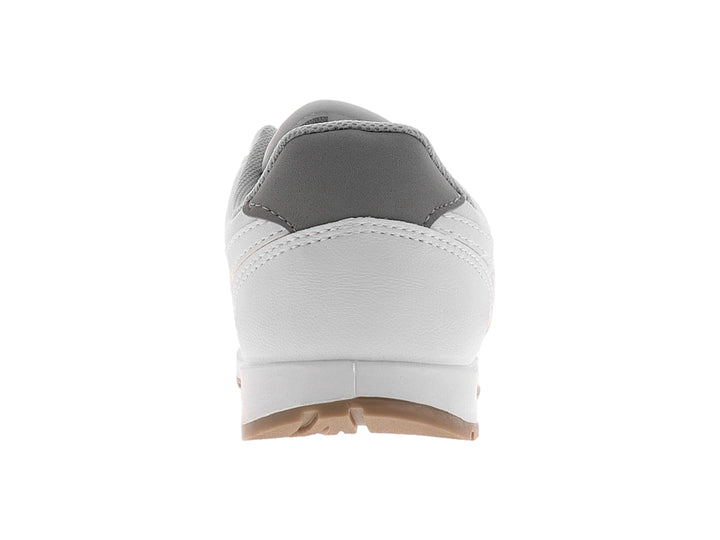 Tenis deportivos color blanco con suela gris y detalles de marca en el lateral y lengüeta.
