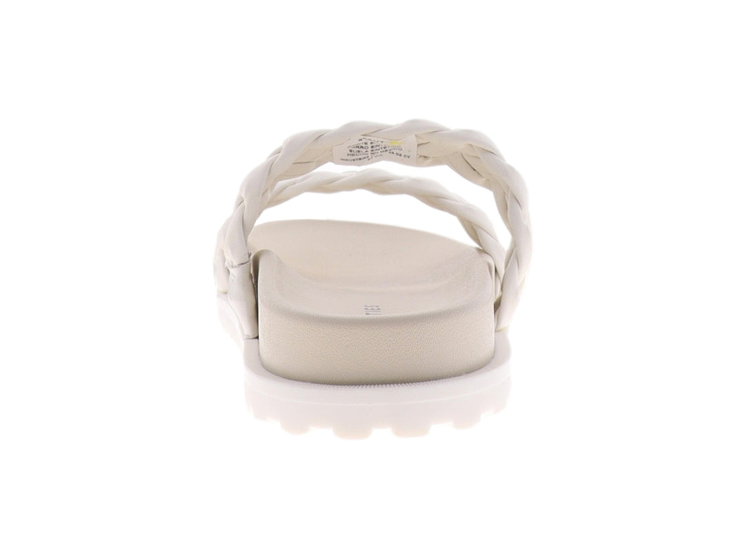 Sandalias Westies color ivory con tiras trenzadas y suela blanca de plataforma ligera.