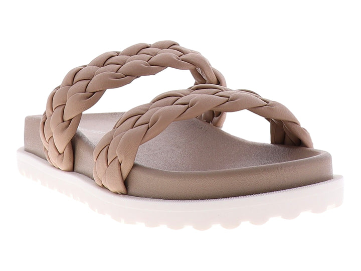 Sandalias color nude con tiras trenzadas y suela blanca de plataforma.