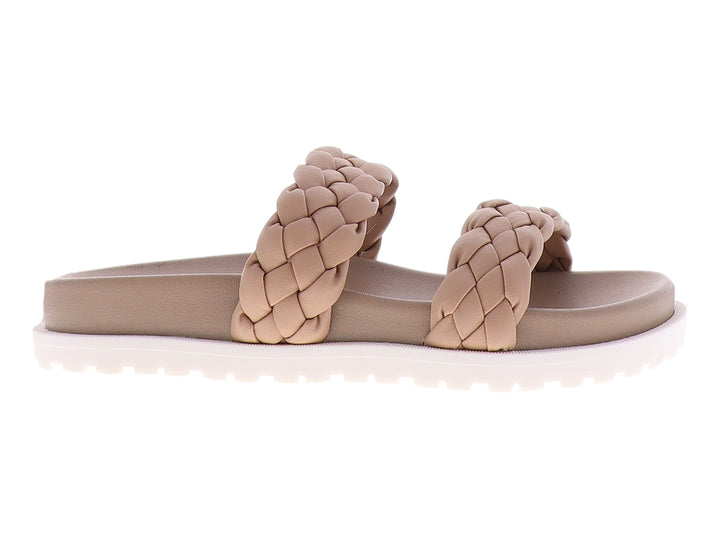 Sandalias color nude con tiras trenzadas y suela blanca de plataforma.