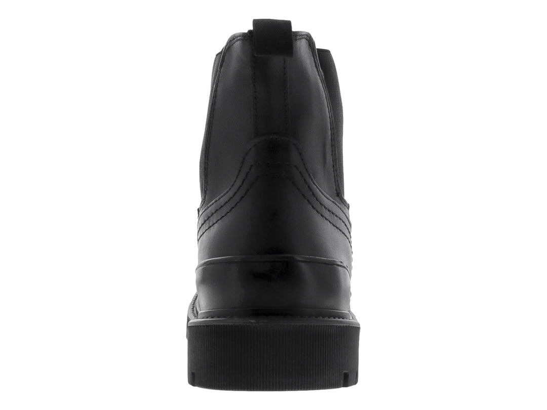 Bota negra de cuero estilo Chelsea con suela track gruesa y dentada.