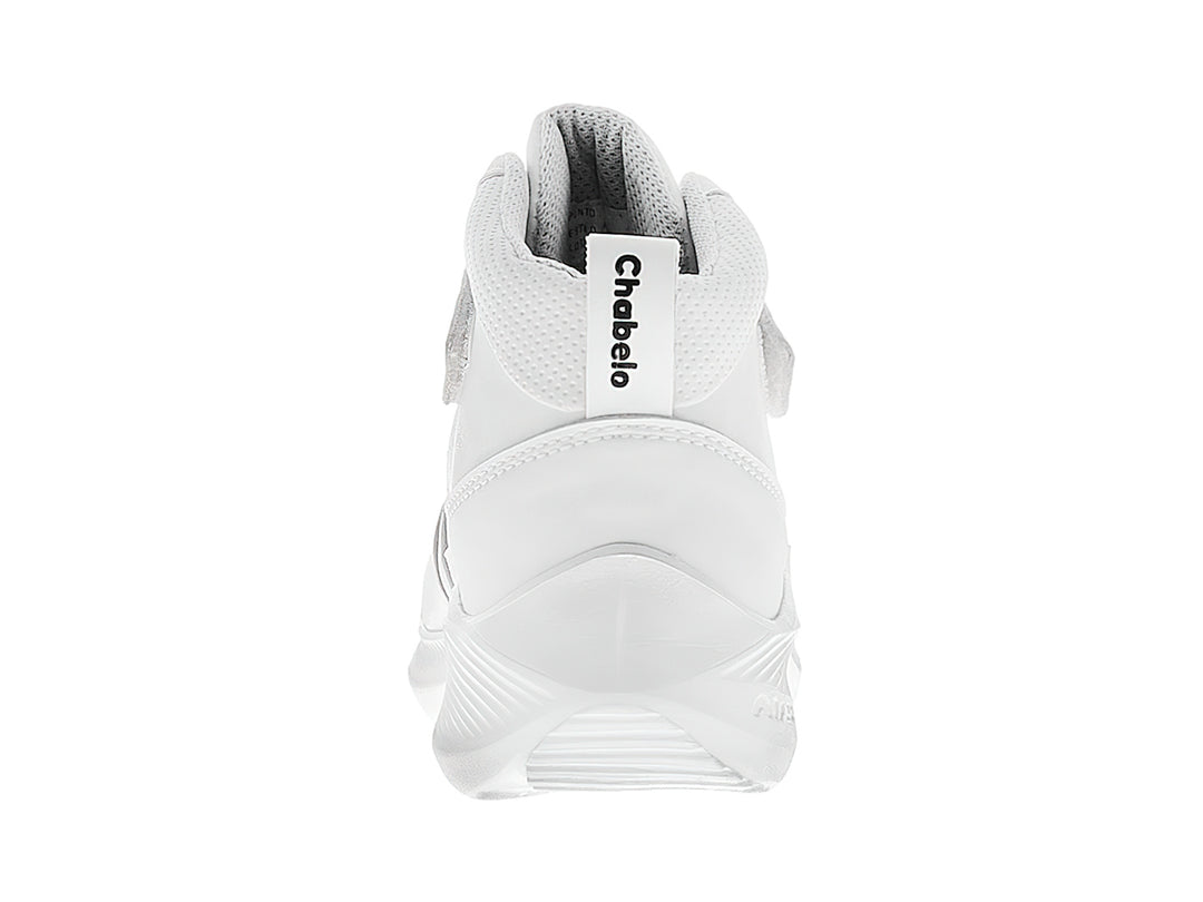 Tenis escolares blancos de la marca Chabelo con agujetas y correa de velcro.