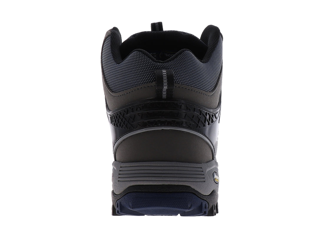Bota deportiva Discovery color marino con detalles en gris y negro, diseñada para actividades al aire libre.