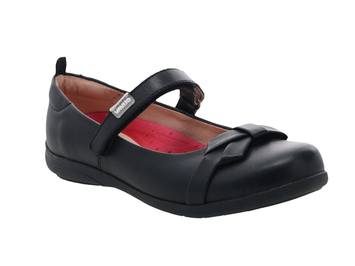 Zapato escolar negro para niña con correa ajustable y detalle de moño frontal.