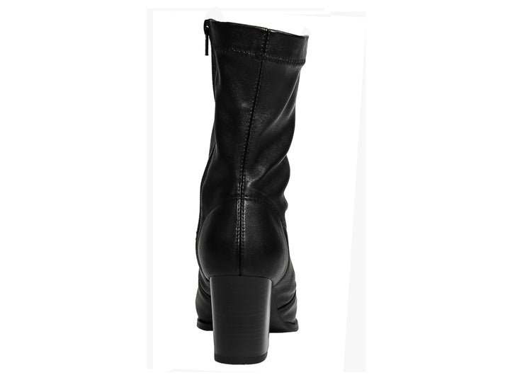 Botín negro de vestir para mujer con tacón cuadrado y caña flexible en material sintético liso.