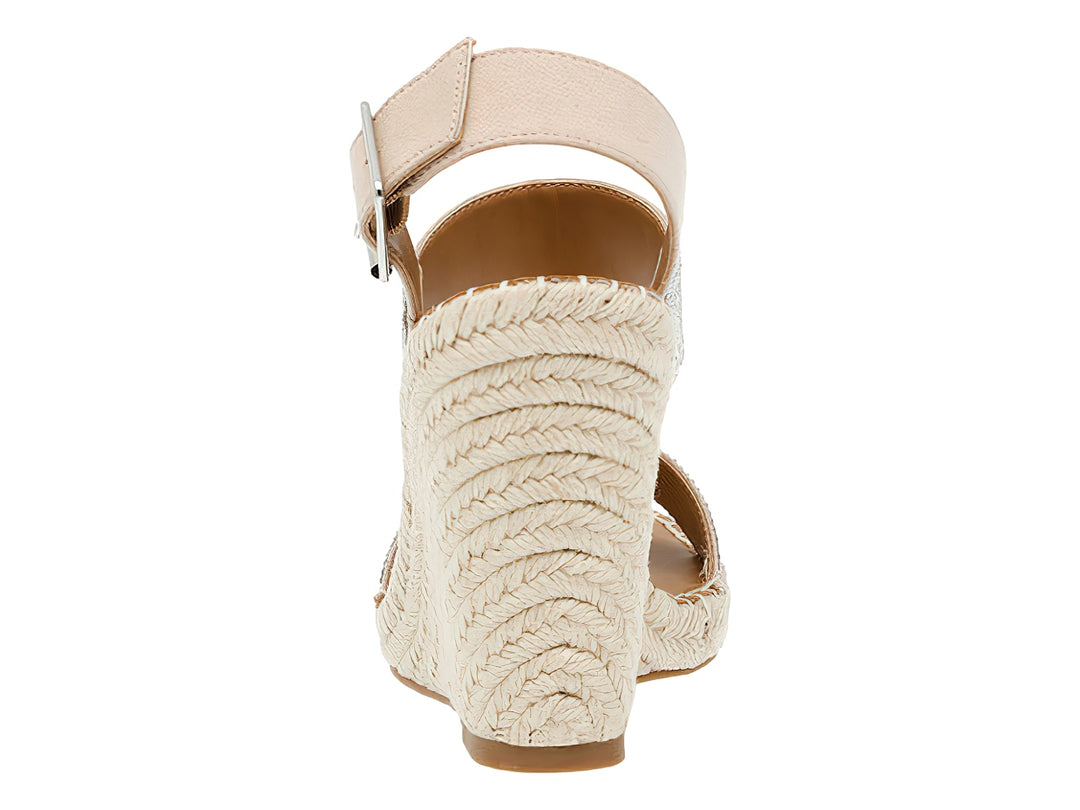 Sandalia de plataforma cuña Steve Madden en color plata con brillantes y base de esparto beige.