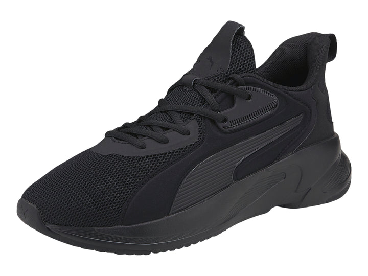 Tenis deportivos PUMA de color negro con suela gruesa y parte superior de malla.