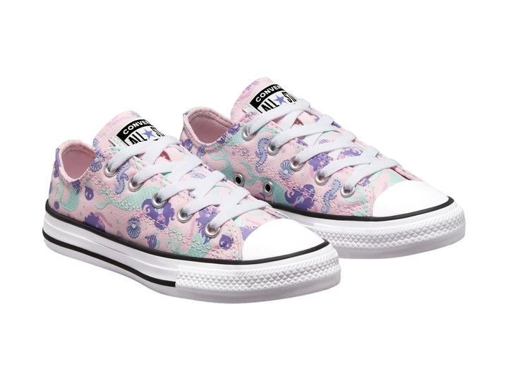 Tenis Converse Chuck Taylor All Star Ox para niño o niña en colores rosa y lila con estampado marino y suela blanca.