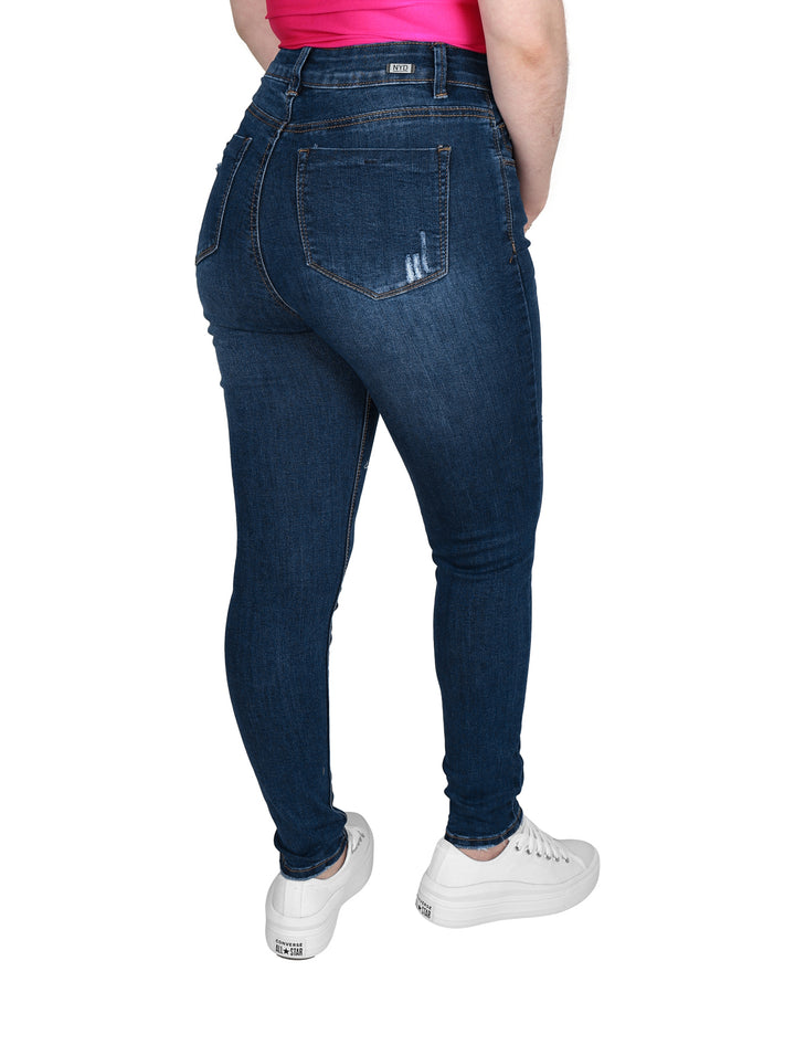 Pantalones jeans azul oscuro ajustados con detalles de destrucción en las rodillas y muslos para mujer.