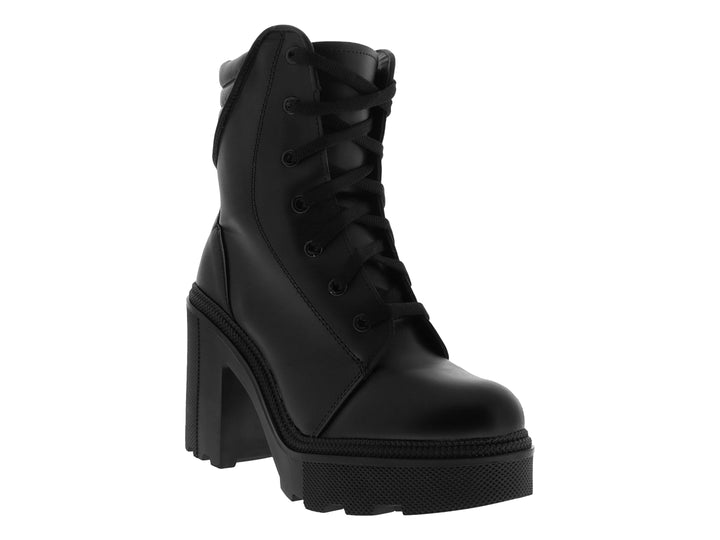 Botas negras de tacón alto y plataforma con agujetas para mujer.