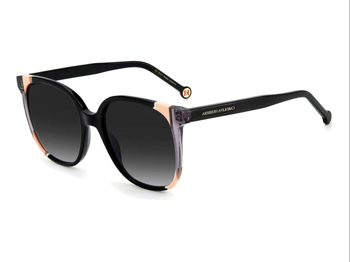 Lentes de sol Carolina Herrera para mujer en color negro con detalles beige en los costados y cristales oscuros.