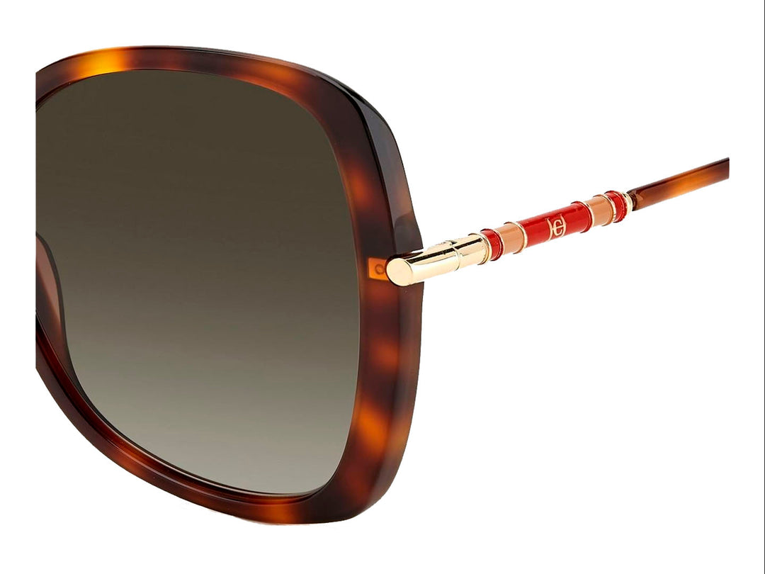 Lentes de sol Carolina Herrera para mujer en color carey con detalles dorados y forma cuadrada.