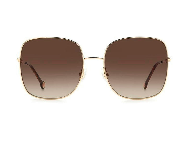 Lentes de sol Carolina Herrera con montura cuadrada dorada y cristales en tono marrón degradado.