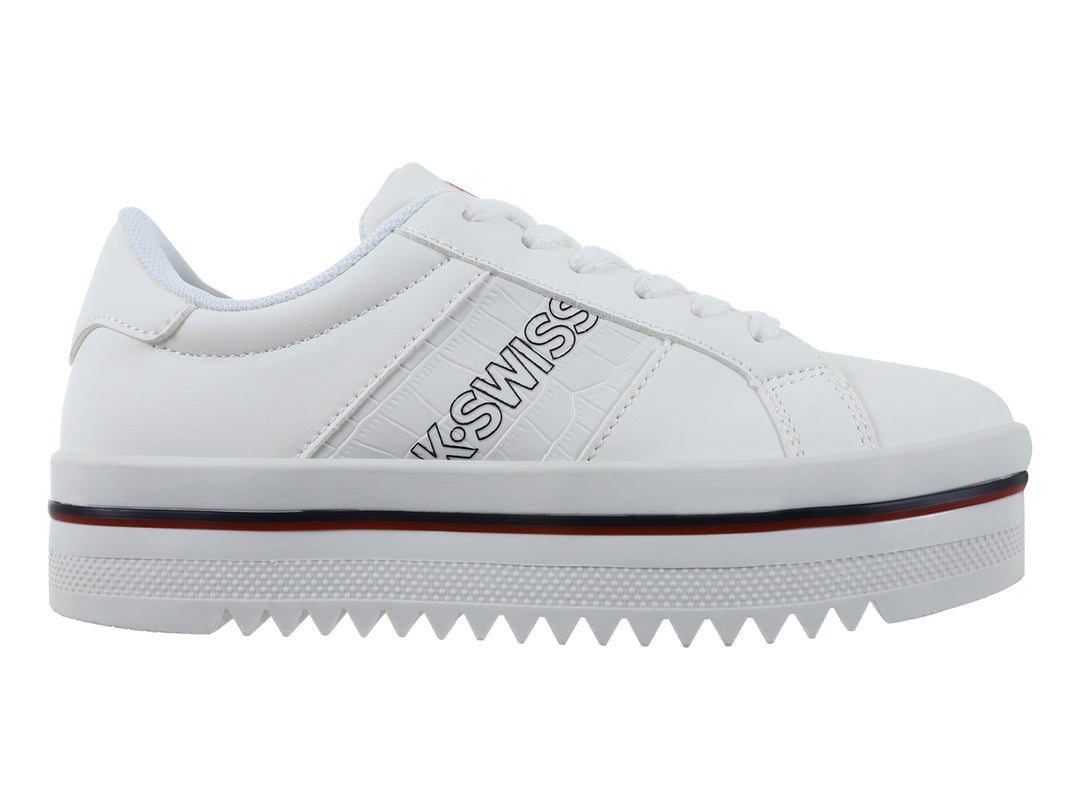 Tenis blancos K-SWISS ZULIK V con suela de plataforma gruesa y detalle en línea roja oscura.
