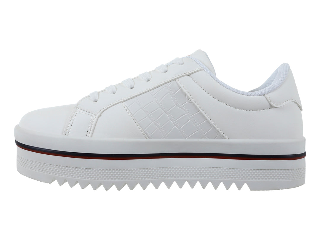 Tenis blancos K-SWISS ZULIK V con suela de plataforma gruesa y detalle en línea roja oscura.
