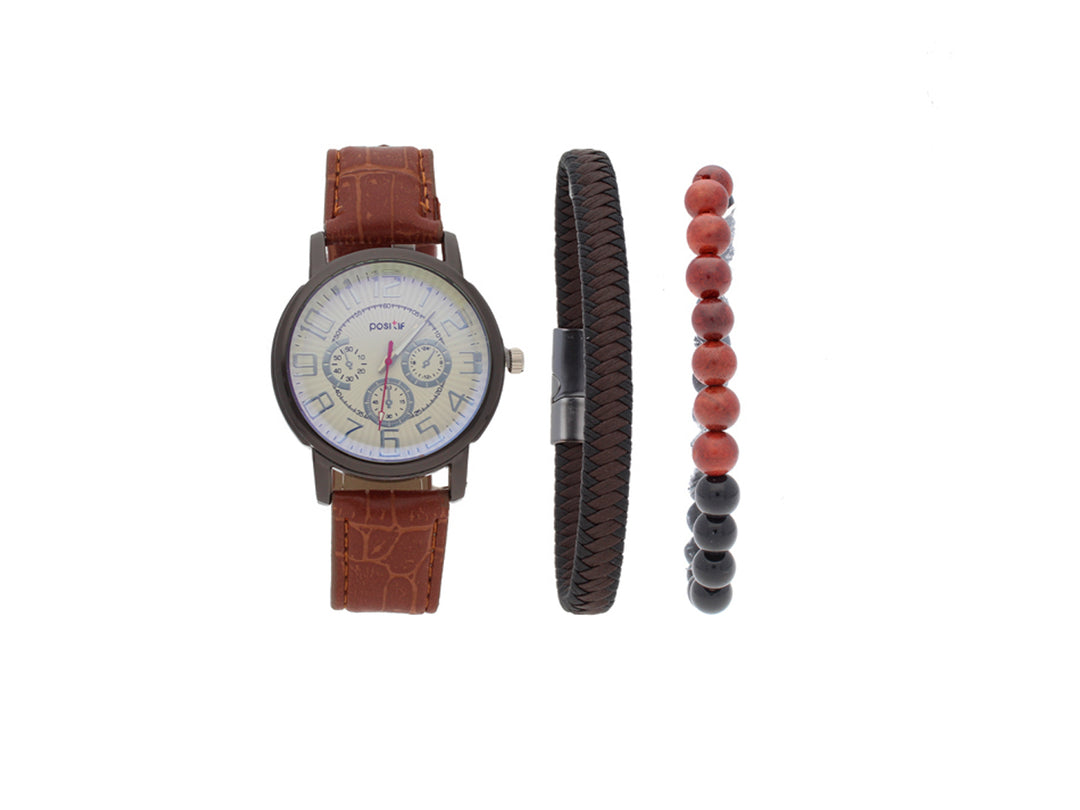 Set de accesorios compuesto por un reloj con correa café y dos pulseras coordinadas sobre fondo blanco.