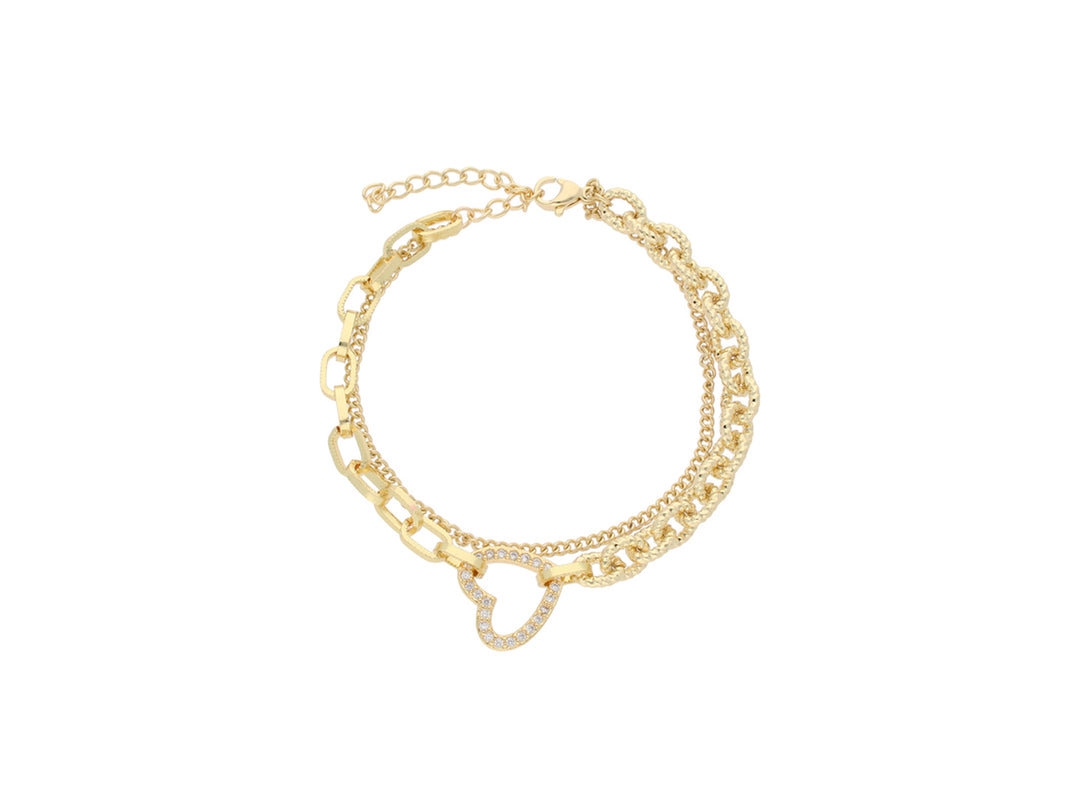 Pulsera de cadena dorada con un dije central en forma de corazón brillante sobre fondo blanco.