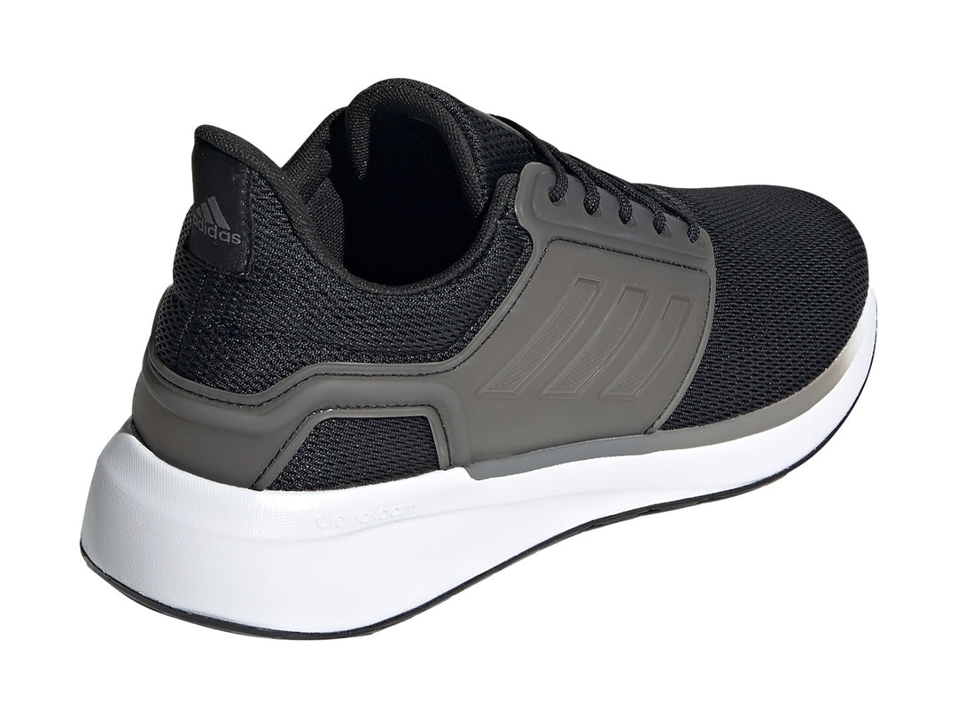Tenis deportivos Adidas para mujer en color negro y gris con suela blanca.