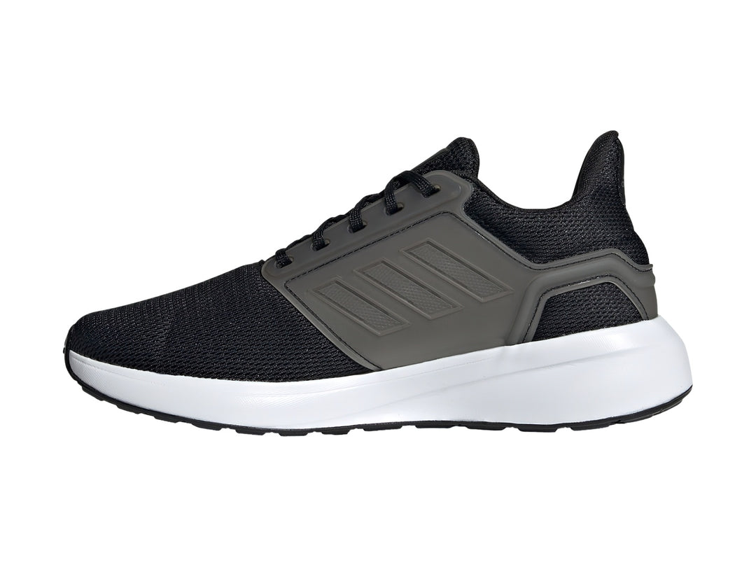 Tenis deportivos Adidas para mujer en color negro y gris con suela blanca.