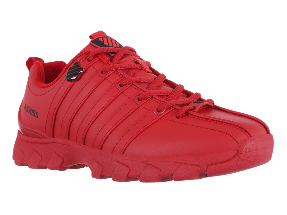 Tenis K-Swiss modelo Haxby 2.0 en color rojo intenso con suela robusta y detalles lineales en el cuerpo.