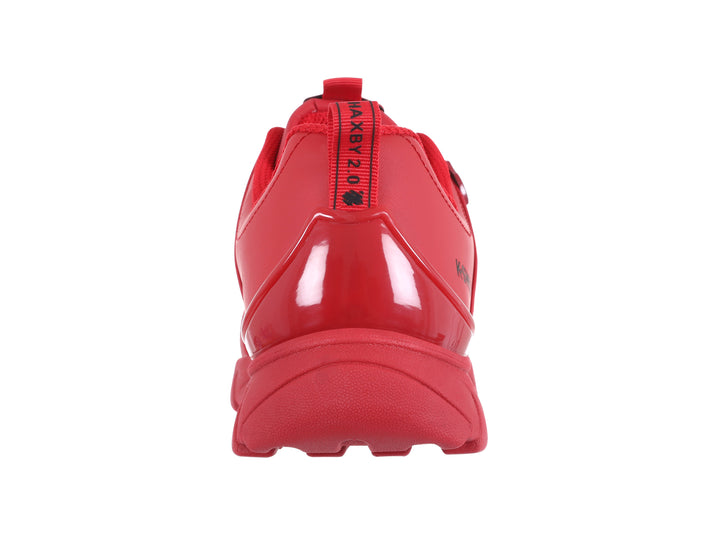Tenis K-Swiss modelo Haxby 2.0 en color rojo intenso con suela robusta y detalles lineales en el cuerpo.