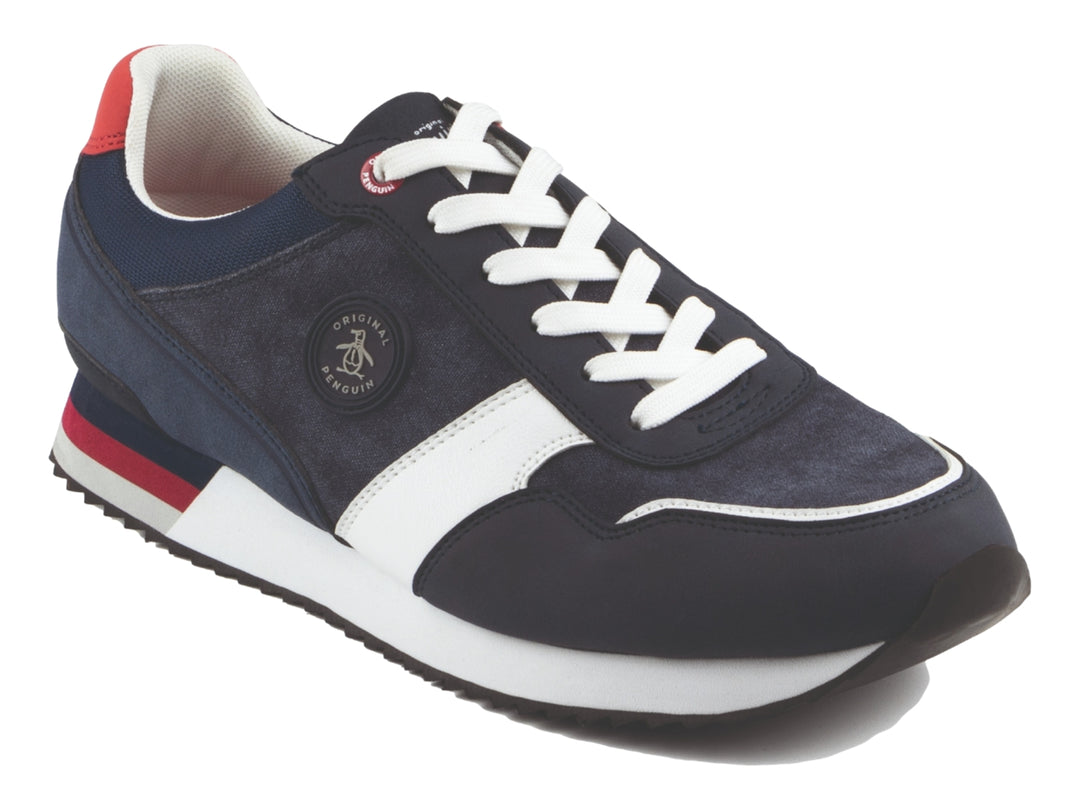 Tenis PENGUIN VIGGO color marino con detalles en blanco y rojo, suela blanca y cordones blancos.