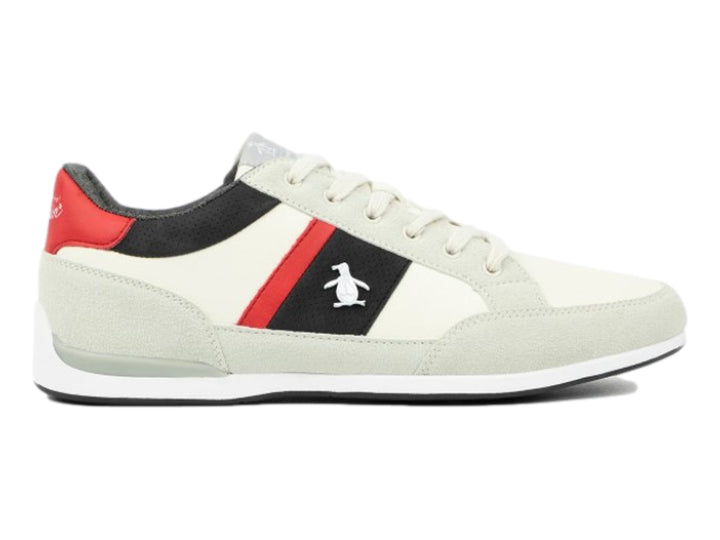Tenis Penguin color beige con franjas laterales en rojo y negro y suela blanca.