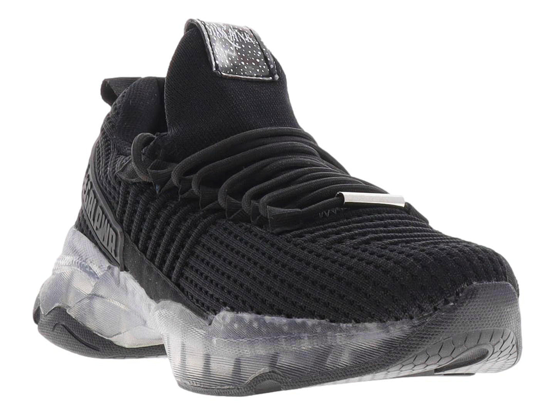 Tenis casuales color negro para mujer con tejido texturizado y suela translúcida.