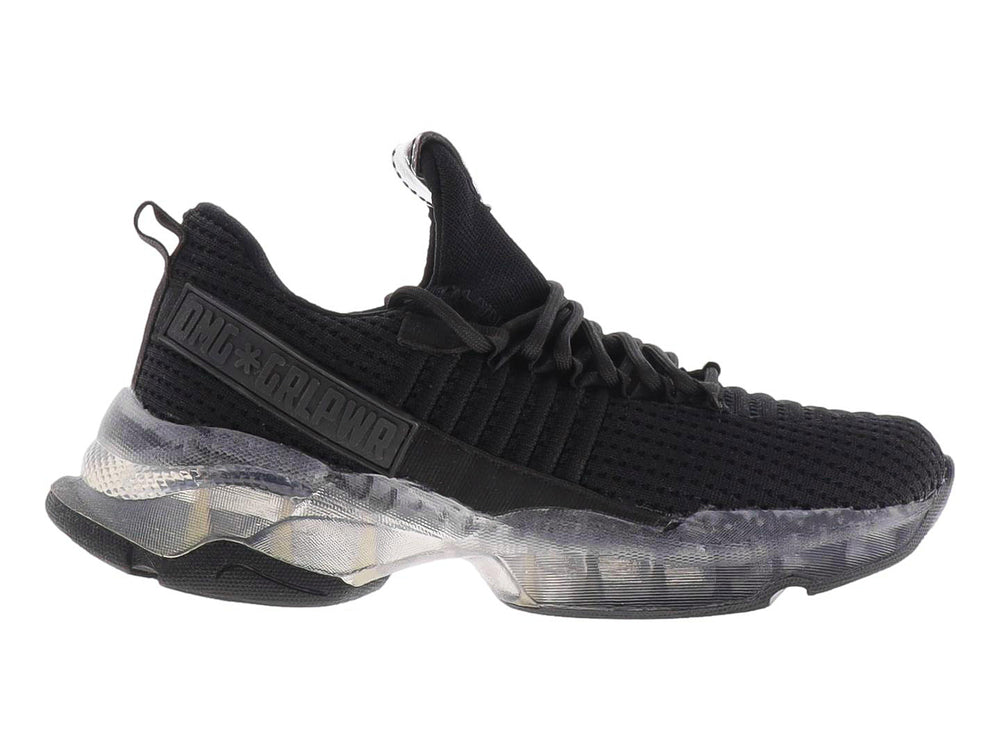 Tenis casuales color negro para mujer con tejido texturizado y suela translúcida.