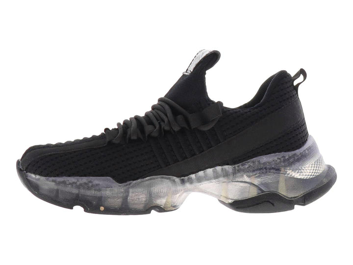Tenis casuales color negro para mujer con tejido texturizado y suela translúcida.