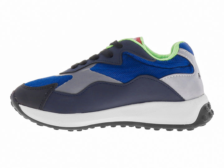 Zapato deportivo infantil color azul cobalto con detalles en blanco, negro y verde lima.
