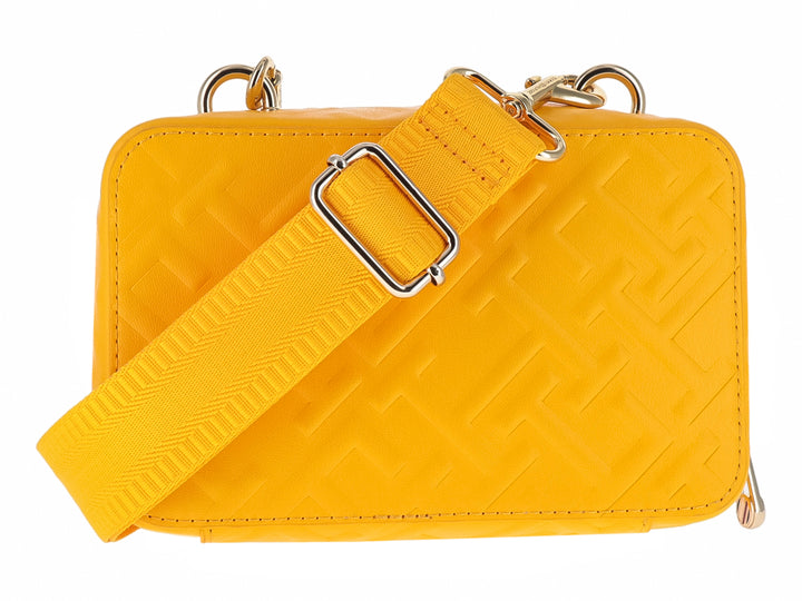 Bolsa pequeña amarilla de Tommy Hilfiger con detalles dorados y textura en relieve.