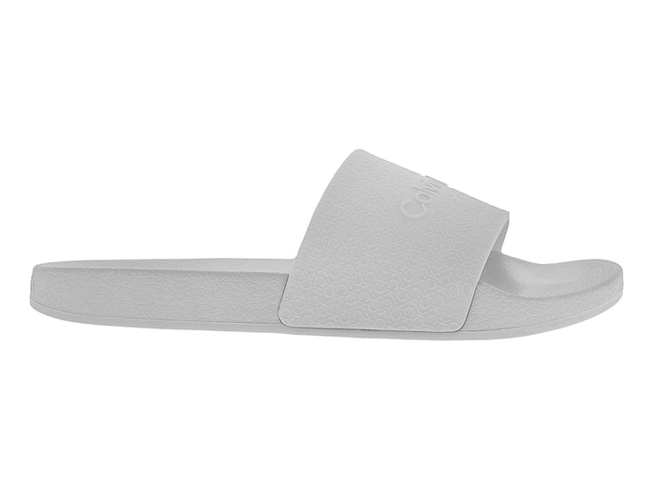 Sandalia slide de color blanco para mujer con logotipo en relieve de Calvin Klein.