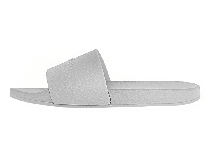 Sandalia slide de color blanco para mujer con logotipo en relieve de Calvin Klein.