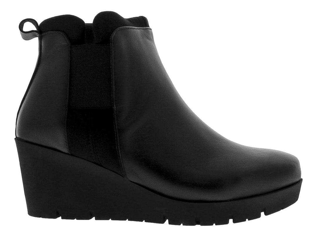 Botín de piel negro para Mujer con plataforma y tacón cuña.