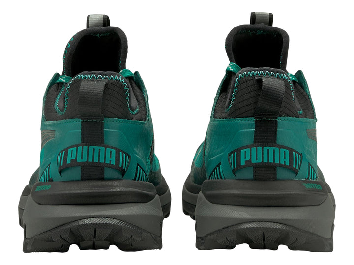 Tenis PUMA Voyage Nitro GTX color verde azulado con suela gris oscuro y detalles negros.