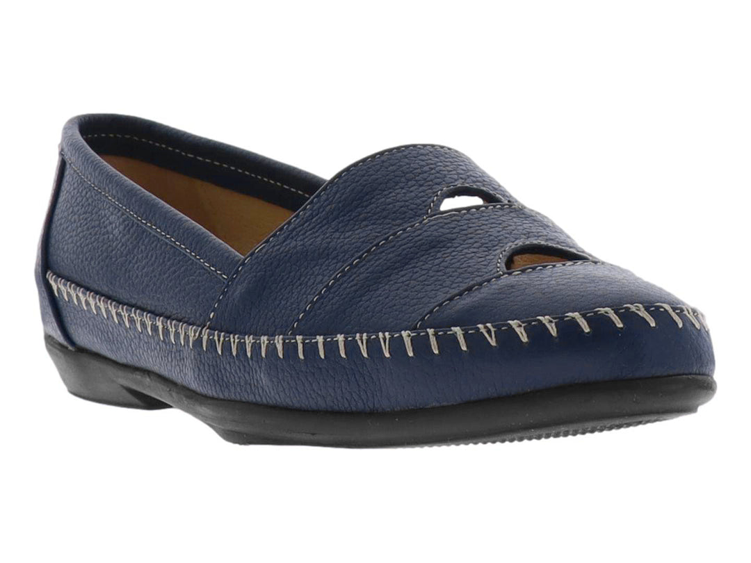Zapato casual plano color azul marino con costuras blancas decorativas y suela negra para mujer.
