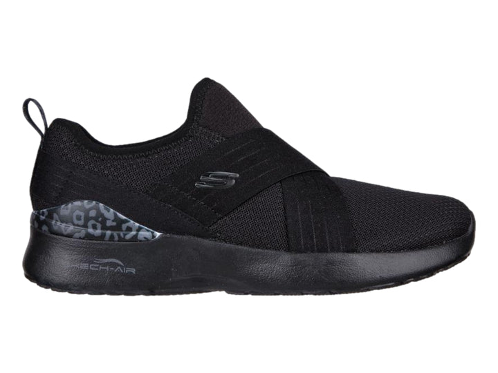 Zapato deportivo Skechers para mujer en color negro, estilo slip-on con detalle decorativo en el talón.